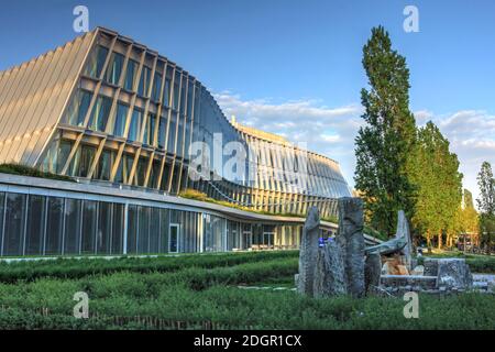 Lausanne, Switzerland - April 22, 2020 - Recently built in the Louis-Bourget Park, the landmark modern building acts as the administrative headquarter Stock Photo