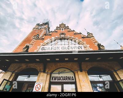 Old town of Gdansk. The building of the main station in Gdansk. Gdansk Railway Station facade. Old beautiful train station. Pola Stock Photo