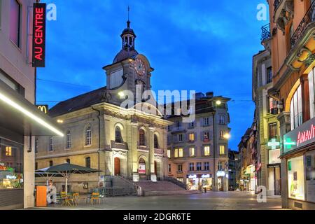 Night scene in Place St-Laurent, with Church of St-Laurent, the commercial center of the Lausanne, Switzerland, yet often overlooked by photographers Stock Photo