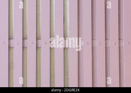 A soft magenta vertical fence wooden style. Stock Photo