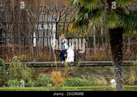 Prince Harry and Meghan Markle at a photocall to announce their engagement at Kensington Palace, London. Photo credit should read: Doug Peters/EMPICS Entertainment  Stock Photo