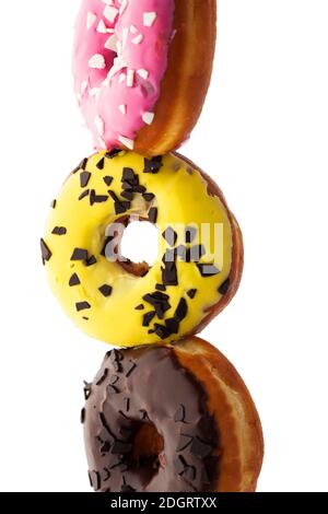 Pile of assorted donuts isolated on white background Stock Photo - Alamy