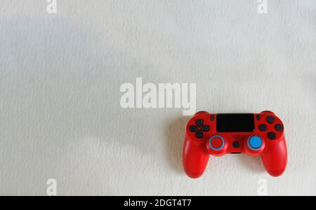 A top view shot of the red gamepad isolated on a white backgrou Stock Photo