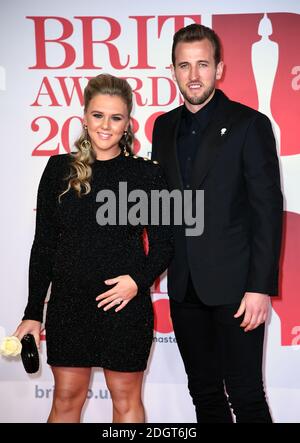 Harry Kane and Katie Goodland attending the Brit Awards at the O2 Arena, London. Photo credit should read: Doug Peters/EMPICS Entertainment Stock Photo