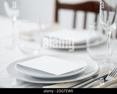 Beautiful table setting in white colors Stock Photo