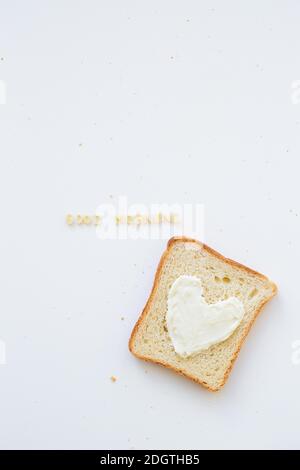 sandwich for breakfast in the form of heart with cheese - good morning inscription Stock Photo