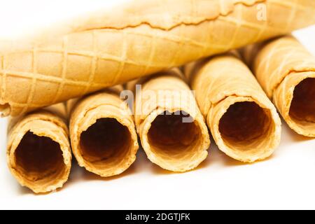 Empty wafer rolls isolated on a white background in a close up view Stock Photo