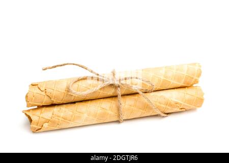 Tied empty wafer rolls isolated on a white background Stock Photo