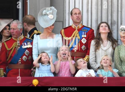 Prince Charles, Prince Harry, Meghan Duchess of Sussex, Catherine Duchess of Cambridge, Prince William, Duke of Cambridge, with Princess Charlotte, Prince George, Savanna Phillips and members of the Royal Family on the balcony of Buckingham Palace at Trooping The Colour, London. Photo credit should read: Doug Peters/EMPICS Stock Photo