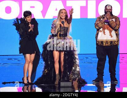 (left to right) Cardi B, Jennifer Lopez and DJ Khaled accept the Best Collaboration award on stage at the MTV Video Music Awards 2018, Radio City, New York. Photo credit should read: Doug Peters/EMPICS Stock Photo