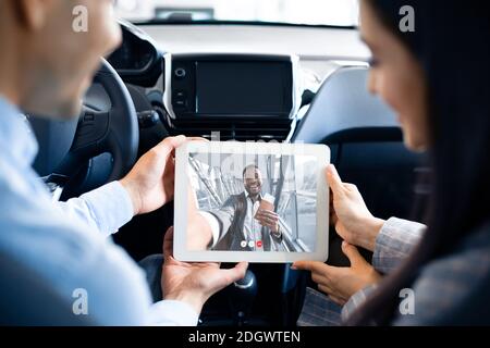 Business People Making Video Call Having Online Meeting In Car Stock Photo