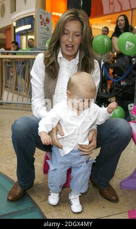 Penny Lancaster and son Alastair launch Capital Radio's Help A London Child Christmas Appeal, live on air outside the Early Learning Centre, Bluewater Shopping Centre, Kent. Stock Photo