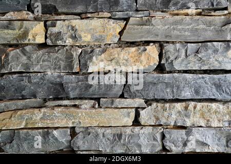 Stone Wall Cladding from natural stone close up Stock Photo