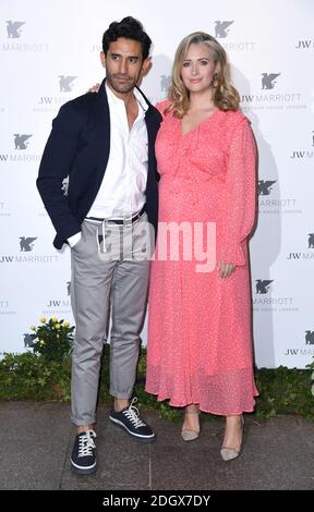 Hayley McQueen and Kirk Newmann attending the JW Marriott Grosvenor House London 90th Anniversary. Picture Credit Should Read: Doug Peters/EMPICS Stock Photo