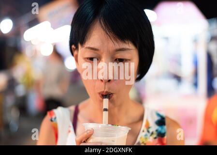 Taiwanese bubble milk tea at night marketplace Stock Photo