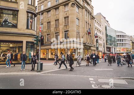 City and shopping streets around October 25, 2018 Dusseldorf, Germany. The theme of shopping in Europe. Central street with shop Stock Photo
