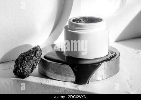black mask with crub by activated charcoal powder and caviar, selective focus Stock Photo