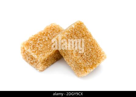 closup on brown sugar cubes isolated on white background Stock Photo