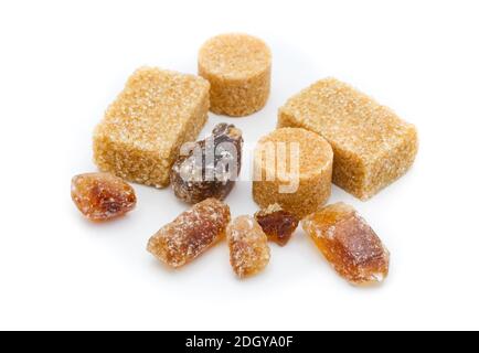 closeup on brown and raw sugar cubes isolated on white background Stock Photo