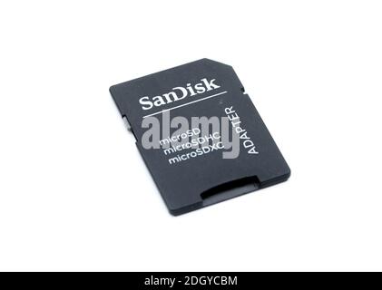 Benon, France - December 7, 2020:Memory card microsd adapter with reflection on white background Stock Photo