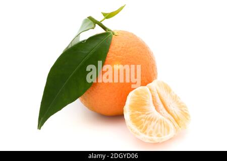 Isolated tangerine. One fresh tangerine or orange fruit isolated on white background with clipping path Stock Photo