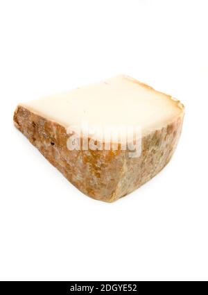 close up of traditional Basque sheep's milk cheese on white background Stock Photo