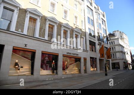 New Bond Street, London, UK. 24th Oct 2019. The refurbished Louis Vuitton  store re opens with a huge and colourful explosion of stars installation on  its corner outside wall. Credit: Guy Bell/Alamy