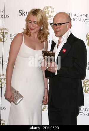 Keeley Hawes and winner Harry Hill with the Best Entertainment Programme award received for Harry Hill's TV Burp at the British Academy Television Awards at the London Palladium, W1. PUBLICATION OF THIS IMAGE AND WINNER RESULTS, IN WHATEVER MEDIUM, WHETHER PRINT, BROADCAST OR ONLINE IS UNDER STRICT EMBARGO TIL 2100 GMT SUNDAY 20 APRIL 2008. Stock Photo