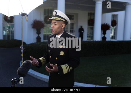 Vice Admiral (VADM) Jerome M. Adams, M.D., M.P.H., United States Surgeon General gives a TV interview outside of the West Wing of the White House on December 8, 2020 in Washington, DC.Credit: Oliver Contreras/Pool via CNP /MediaPunch Stock Photo