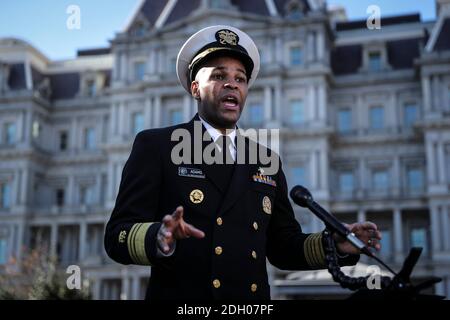 Vice Admiral (VADM) Jerome M. Adams, M.D., M.P.H., United States Surgeon General gives a TV interview outside of the West Wing of the White House on December 8, 2020 in Washington, DC.Credit: Oliver Contreras/Pool via CNP /MediaPunch Stock Photo