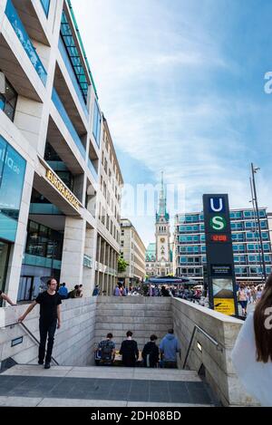 Hamburg, Germany - August 23, 2019: Facade of the Europa Passage, Hamburg luxury shopping arcade in Jungfernstieg,  and an entrance of a subway statio Stock Photo