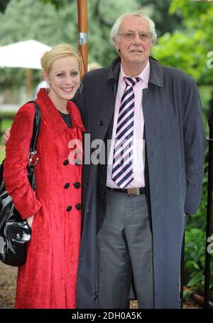 Barry Norman and daughter arrive at Sir David Frost's Summer Garden Party, in Carlyle Square, west London. Stock Photo