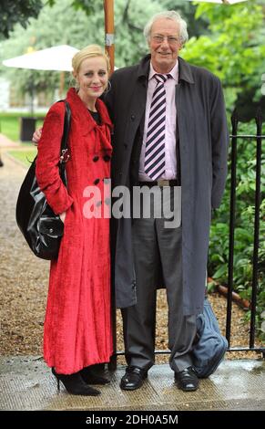 Barry Norman and daughter arrive at Sir David Frost's Summer Garden Party, in Carlyle Square, west London. Stock Photo