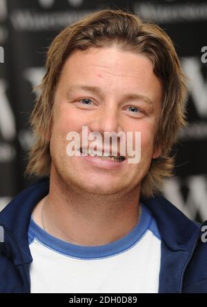 Jamie Oliver signs copies of his new book Jamie's Ministry of Food, Waterstones, London. Stock Photo
