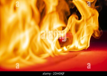 Pool Balls Are Lit On Fire While Sitting On A Pool Table In An Outdoor Environment Stock Photo