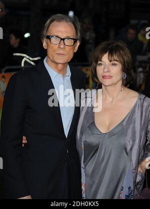 Bill Nighy and wife arriving for the premiere of The Boat That Rocked at the Odeon Leicester Square, London. Stock Photo