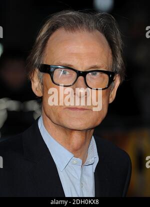 Bill Nighy and wife arriving for the premiere of The Boat That Rocked at the Odeon Leicester Square, London. Stock Photo