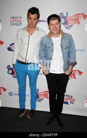 Mark Ronson (left) and Daniel Merriweather in the press run at Capital 95.8 Summertime Ball with Barclaycard at the Emirates Stadium. Stock Photo