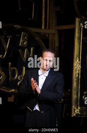 Derren Brown on stage for the 'Enigma' stage show at the Adelphi Theatre, The Strand, London Stock Photo