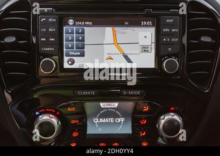 Panel of a modern car. Screen multimedia system. Stock Photo