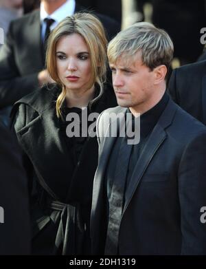 Kian Egan from Westlife and girlfriend Jodi Albert pictured after attending a service at St Laurence O'Toole's Church for the funeral of Stephen Gatley, Dublin, Ireland. Stock Photo