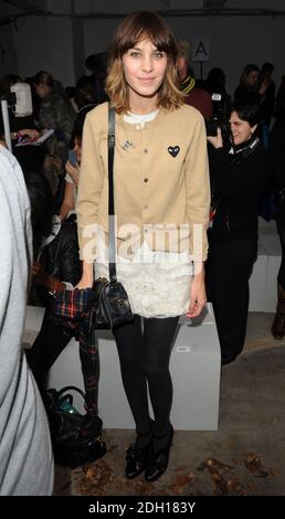 Alexa Chung attends the Unique catwalk show during London Fashion Week at Flower Cellars, central London. Stock Photo