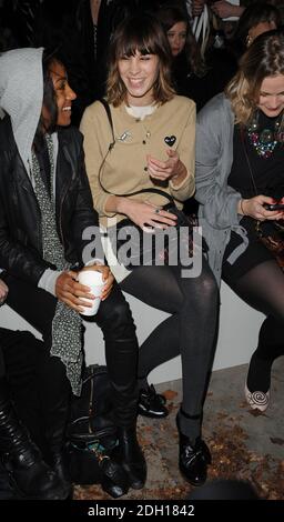 Alexa Chung attends the Unique catwalk show during London Fashion Week at Flower Cellars, central London. Stock Photo