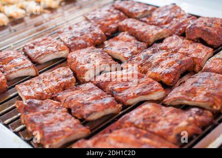 Close up of barbecue grill with delicious spare ribs. Stock Photo