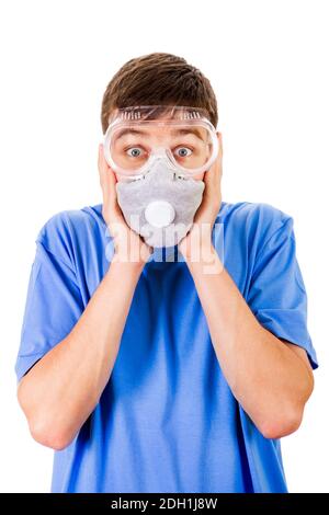 Shocked Young Man in Gas Mask and in a Safety Glasses on the White Background Stock Photo