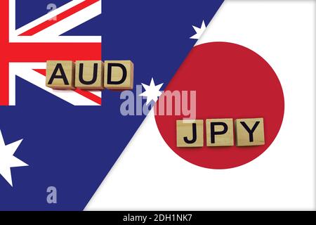 Australia and Japan currencies codes on national flags background. International money transfer concept Stock Photo