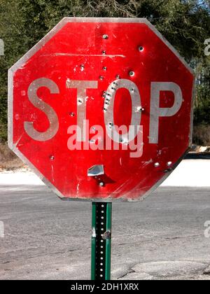 Stop Sign with bullet holes Stock Photo - Alamy