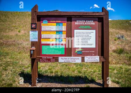 A description board of rules and fees in Lewis and Clark Caverns NP, Montana Stock Photo