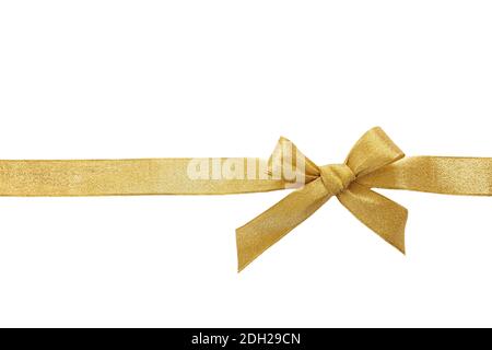 Gold bow with ribbon isolated cutout on white background, Decorative golden Christmas, valentine day, birthday present concept. Stock Photo