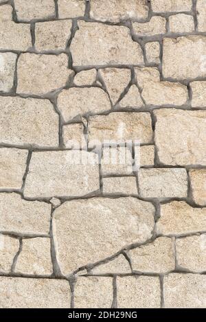 Rustic stone wall background. Abstract pattern backdrop. Stock Photo